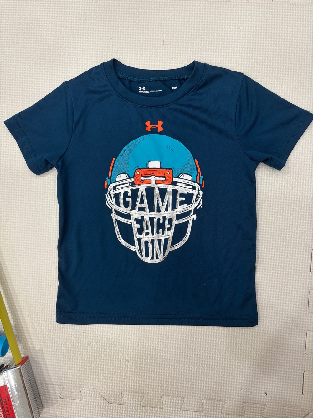 Under Armour Navy Tee with Bright Aqua & Orange Helmet Graphic